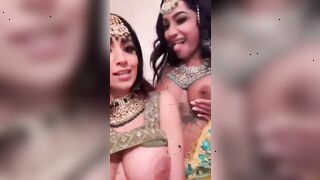 yasmina khan and other girl in cultural clothing talking