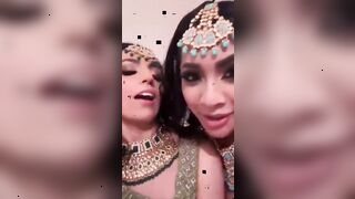 yasmina khan and other girl in cultural clothing talking